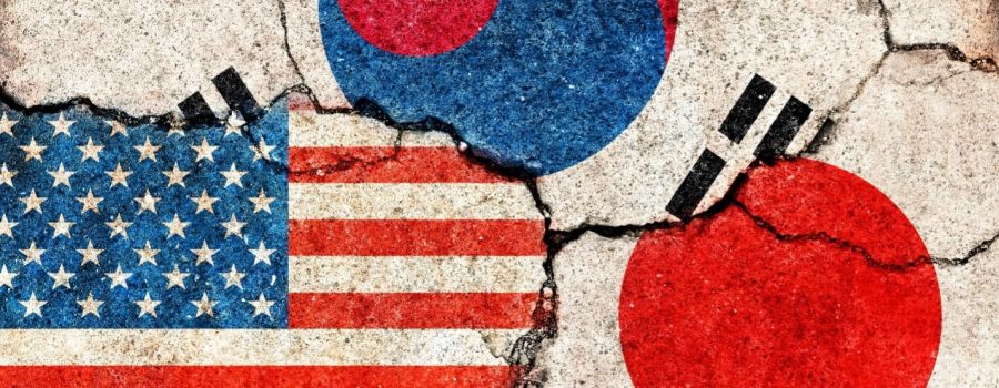 US, Korean, and Japanese flags together